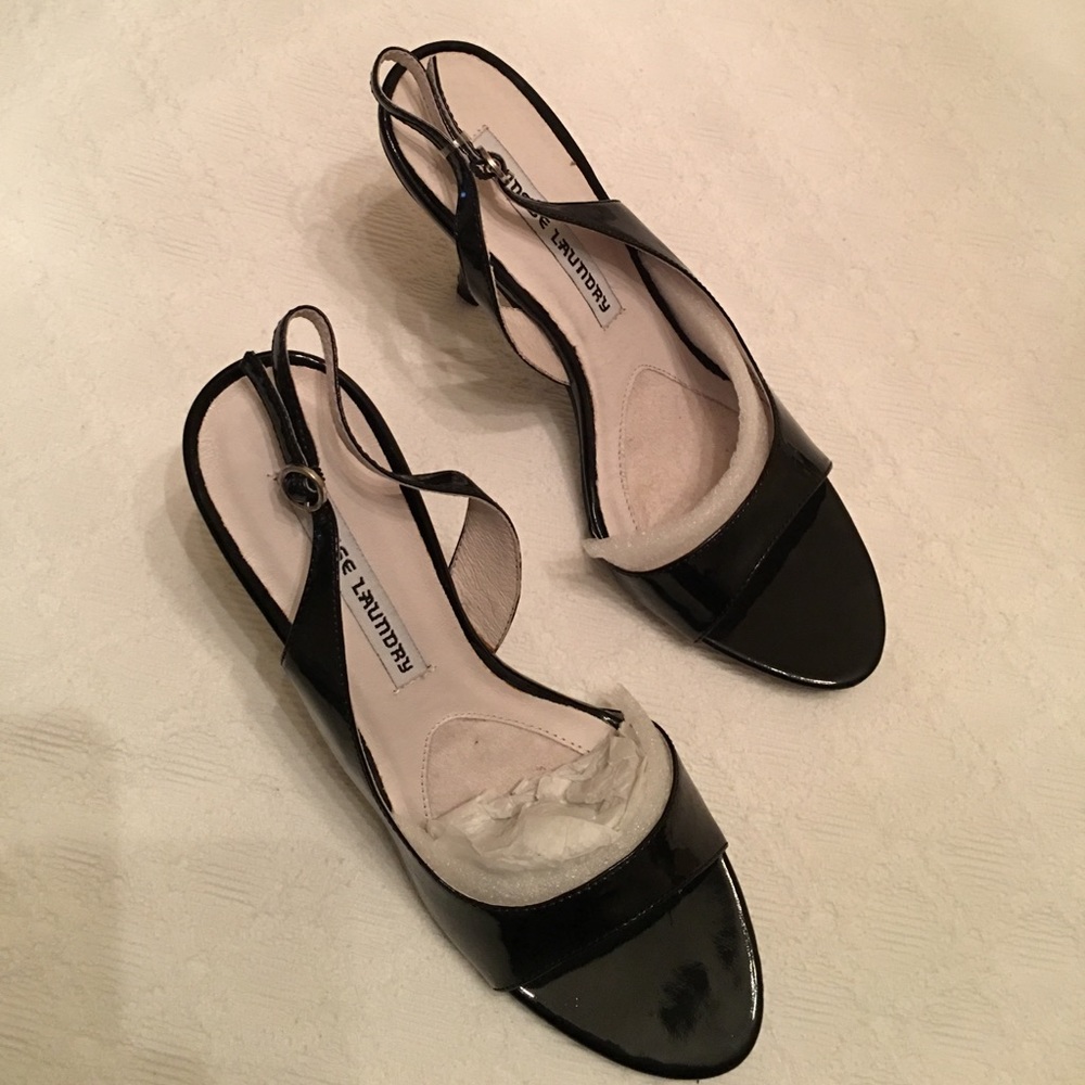 Black patent slip on heels. Heels are 4 3/8”