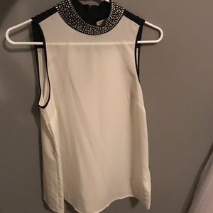 Dressy tank top with studded neck