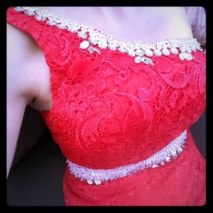 Elegant red lace sequin gown.