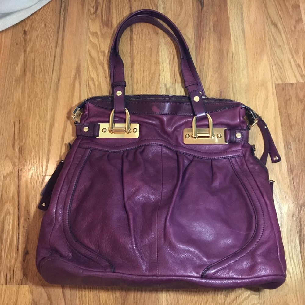 Purple leather B Makowsky purse great condition
