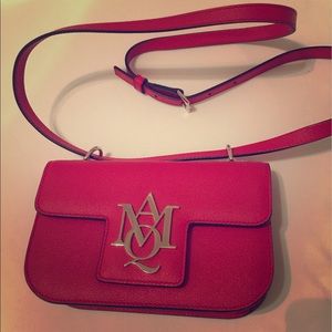 Alexander McQueen red clutch