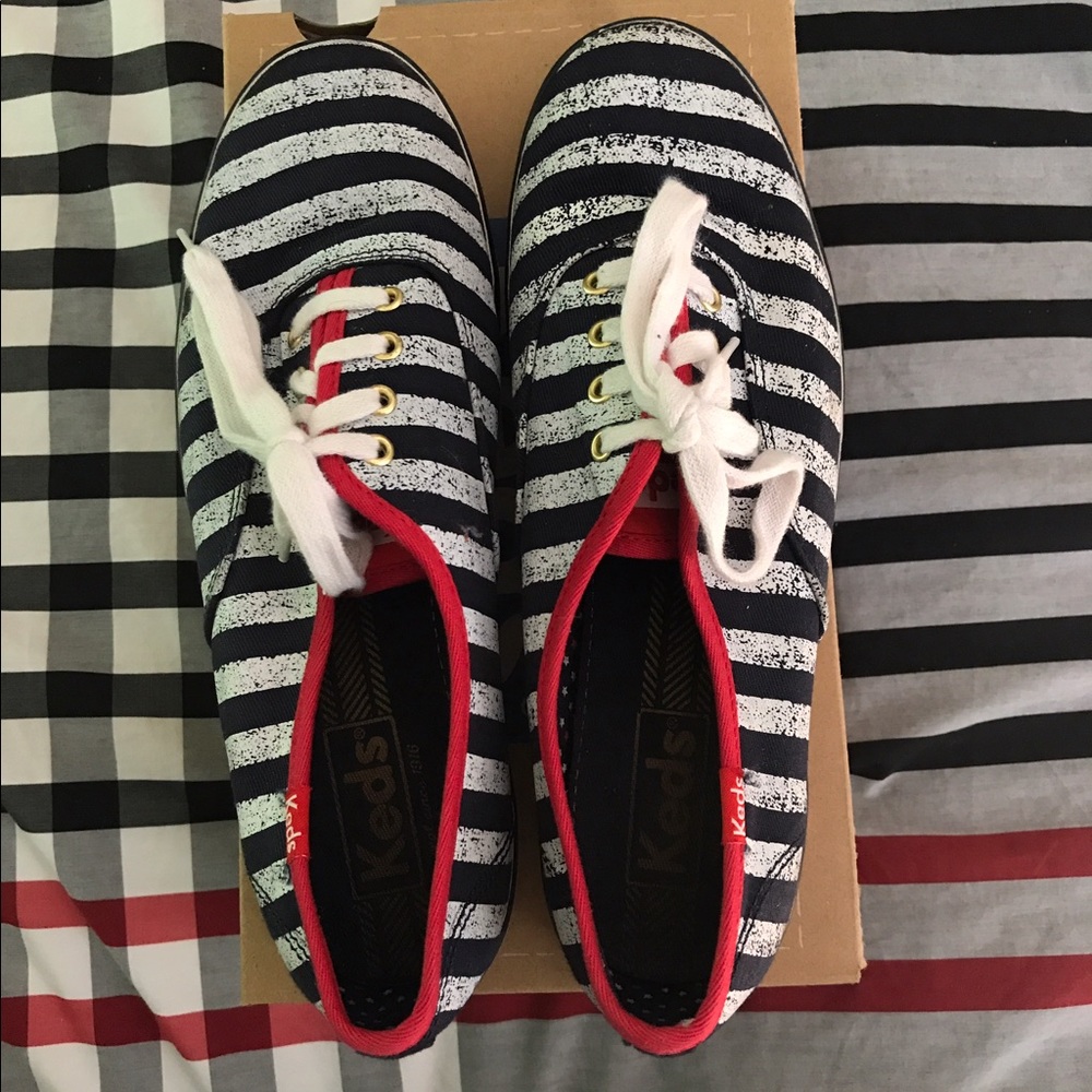 navy and white striped Keds with red lining