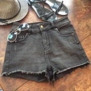 Tons of stretch! Distressed cut off cheeky denim shorts