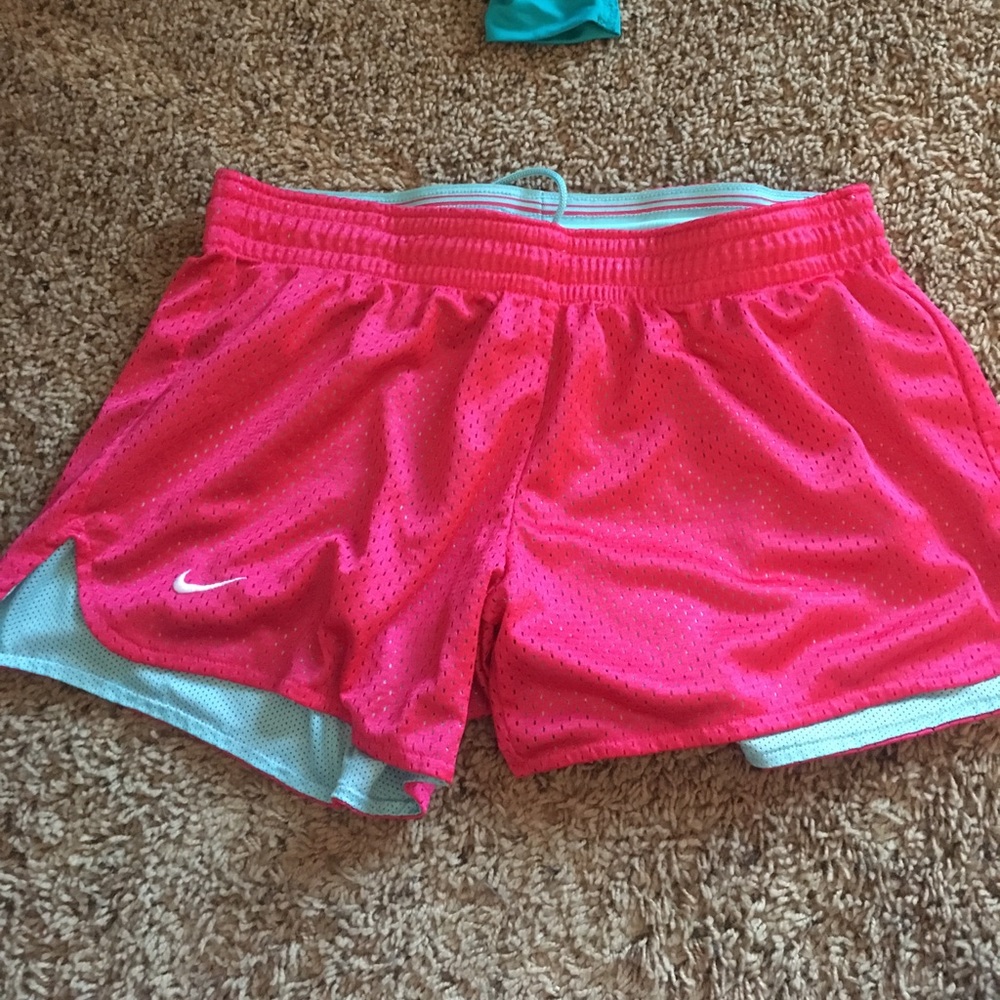 Pink Nike shorts