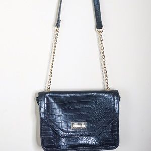 Black snake skin handbag with Gold chain