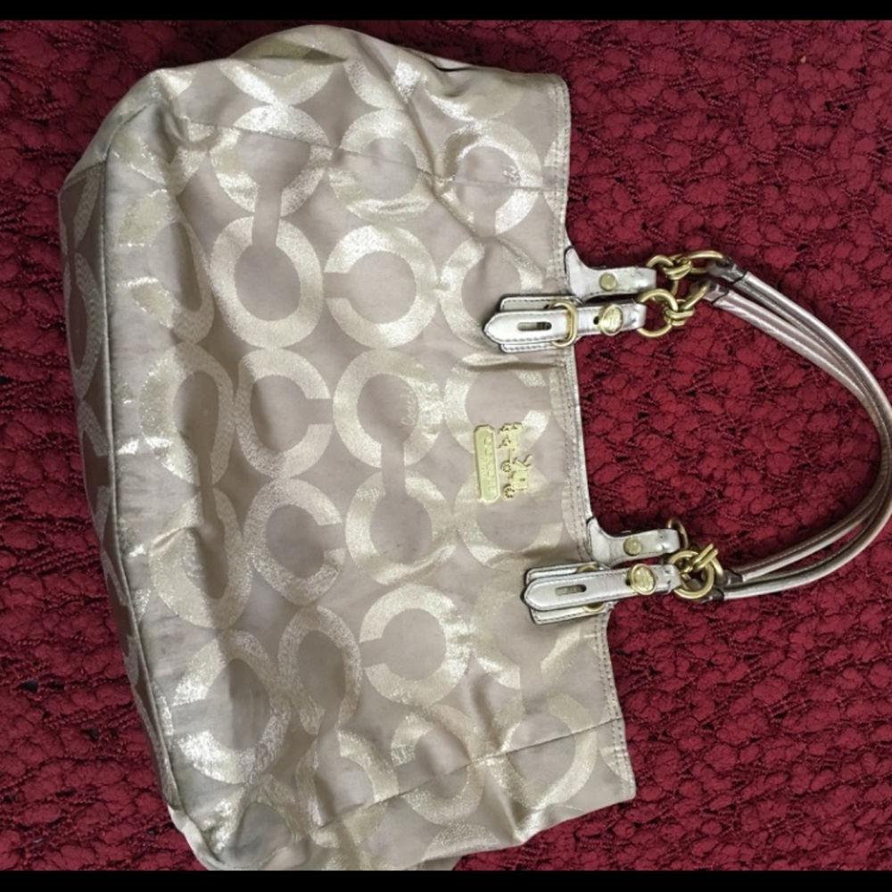 Gold coach purse