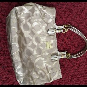 Gold coach purse
