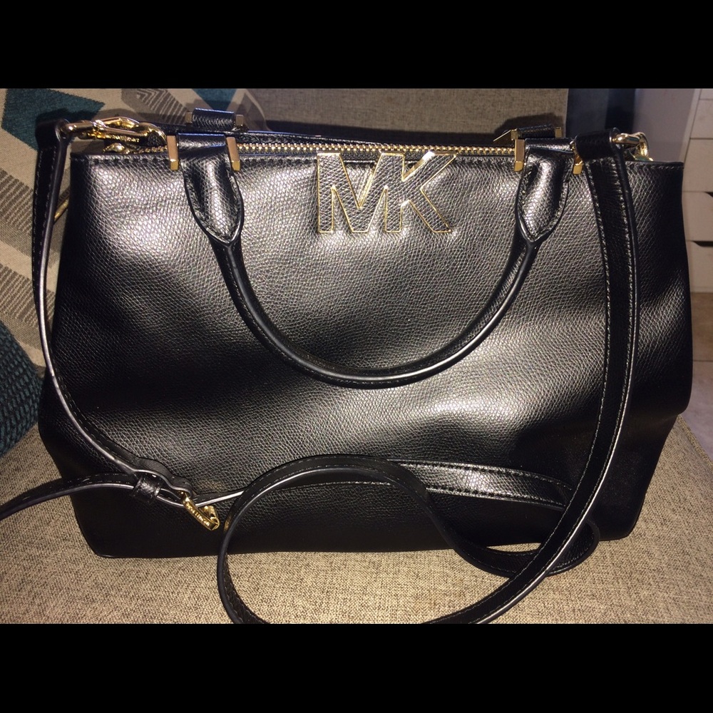 black MK handbag.