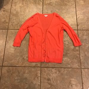 Peach colored button up cardigan