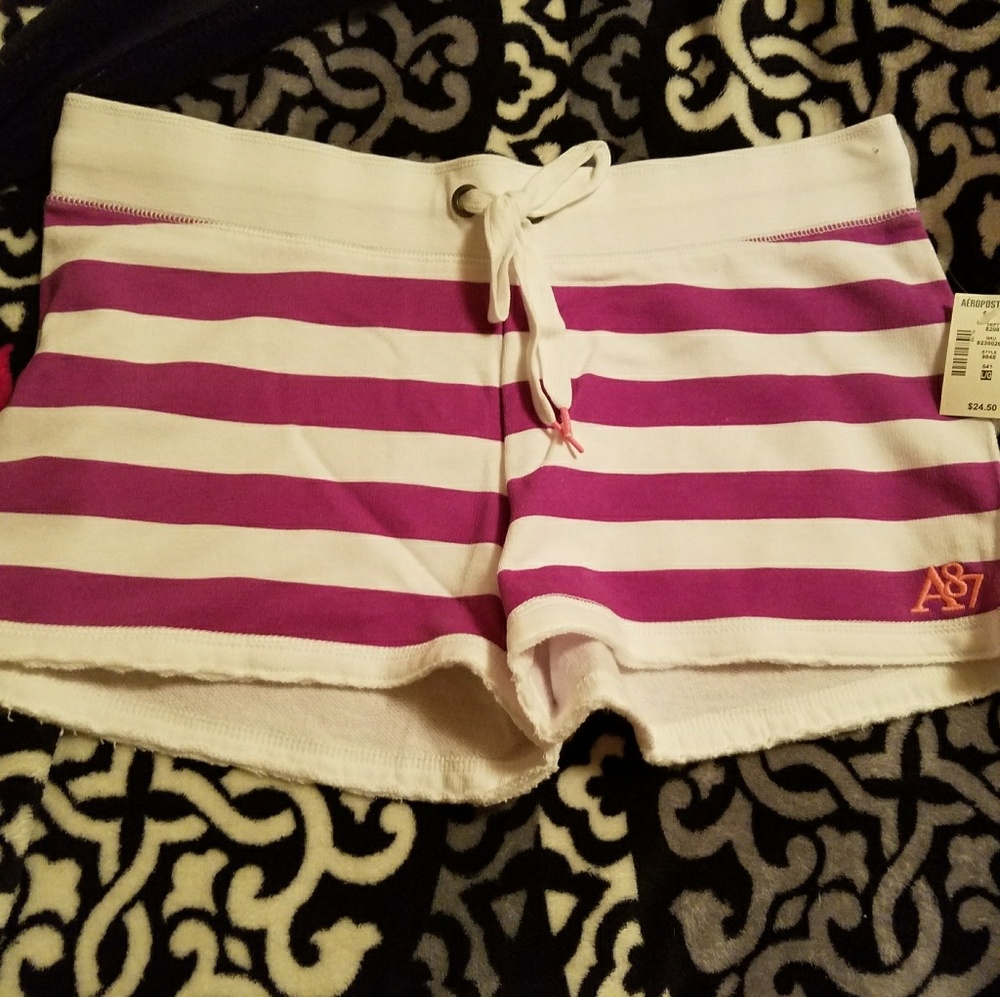 New with tags, purple and white aero shorts. Large
