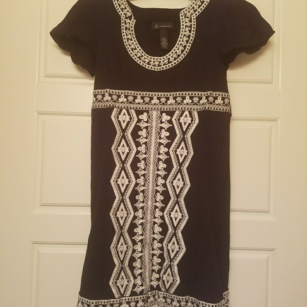 Black dress with white embroidery