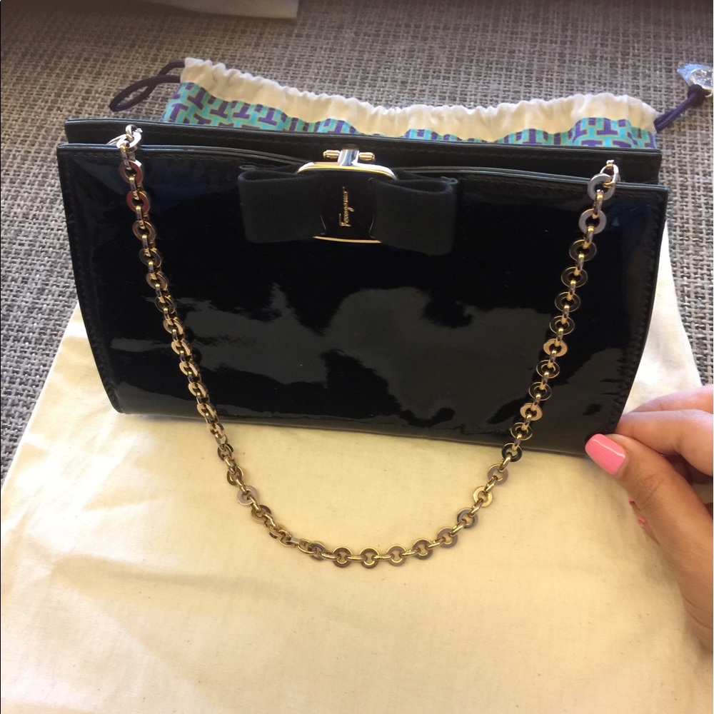 Ferragamo Black mini clutch w/ chain