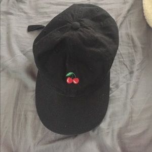 Black cap with cherry