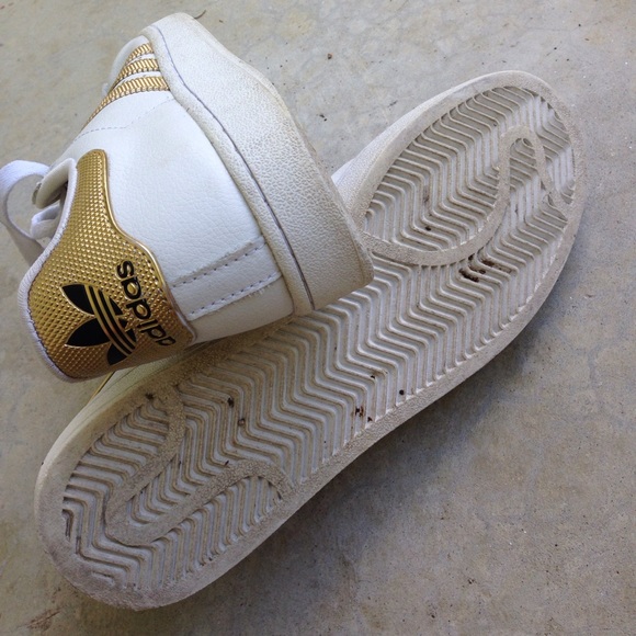 white superstars gold stripes
