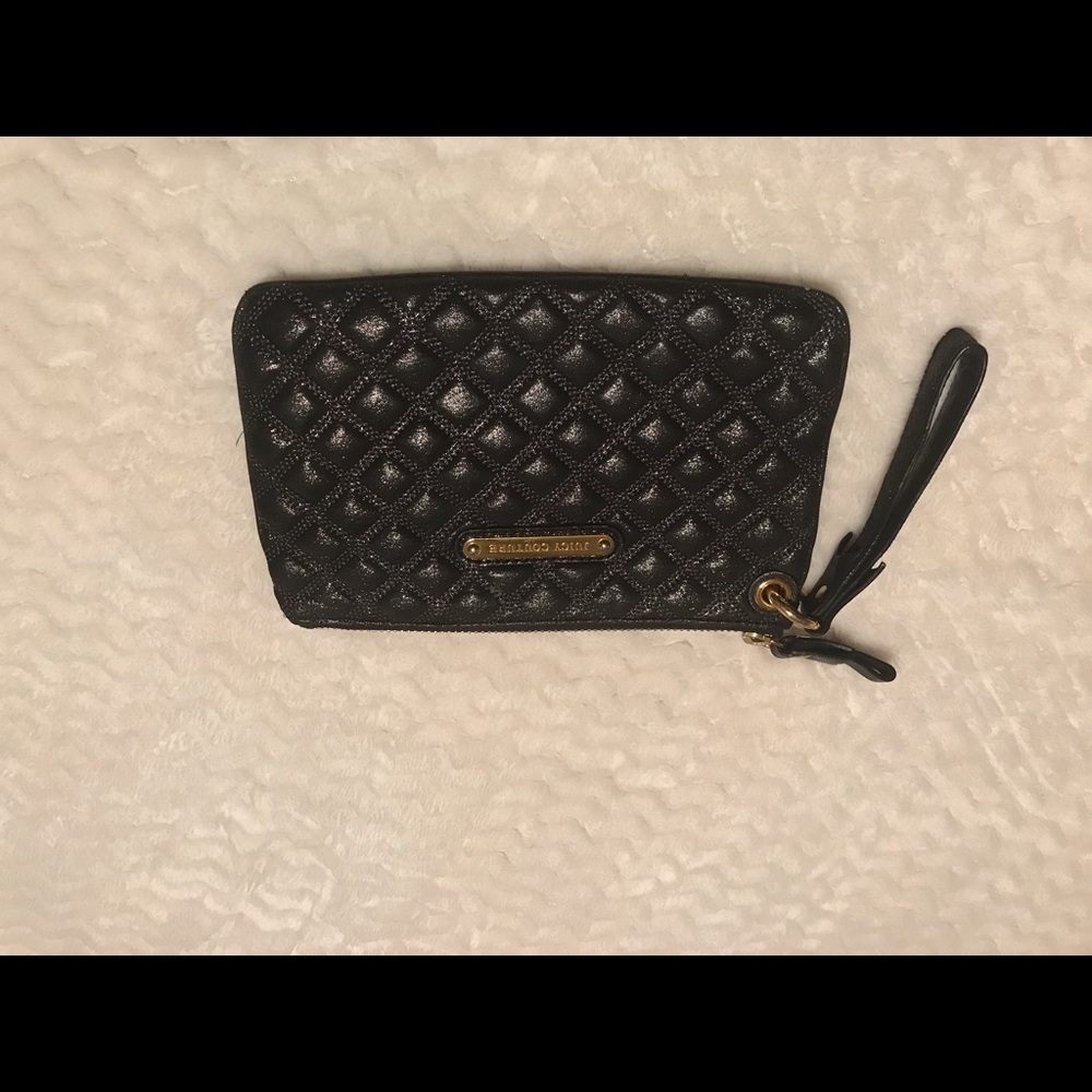 Black JC Clutch. Gently used.