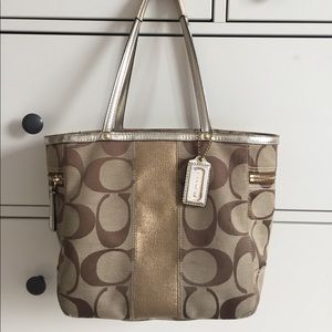 Beautiful gold Coach purse lightly used