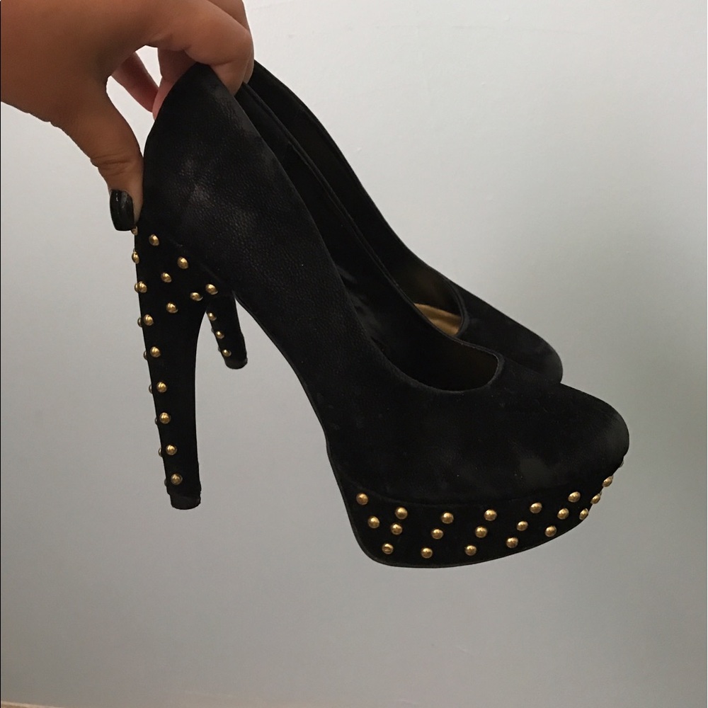 Black studded pumps