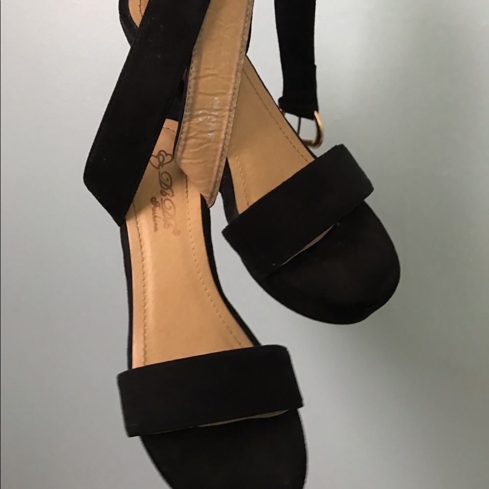 Cross over black wedges