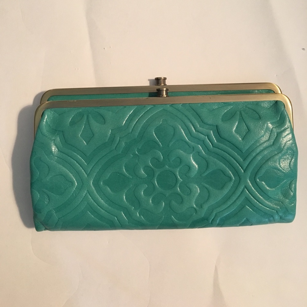 SOLD ! ⚪️ Turquoise Hobo International Clutch