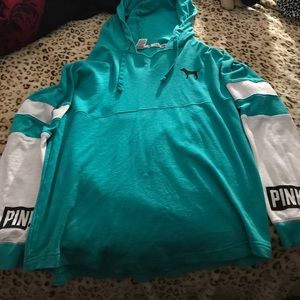 PINK long sleeved hooded shirt.