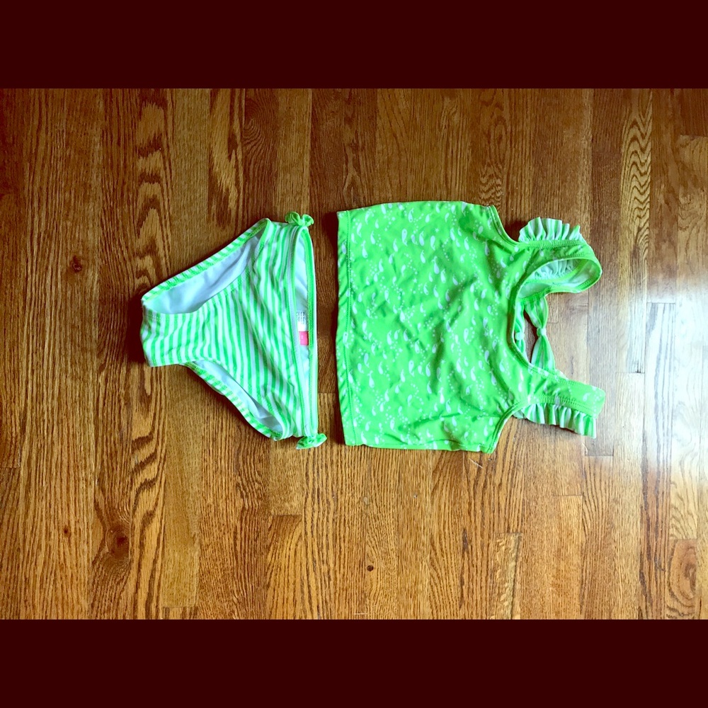 Girls VERY cute swim suit. Never worn.