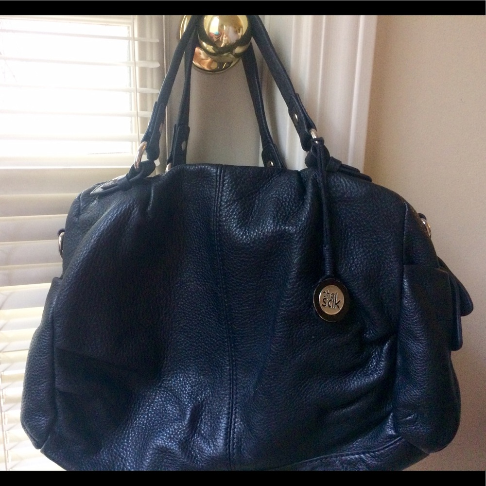 The Sak black leather purse