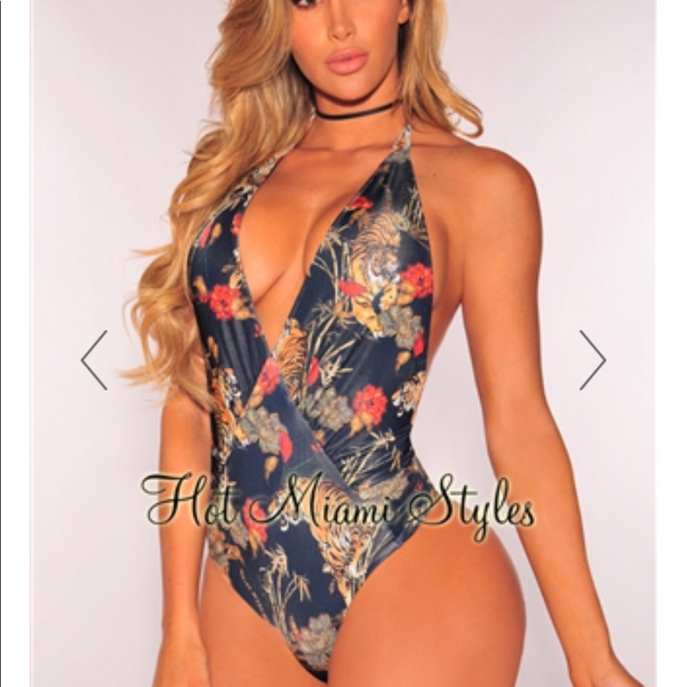 NWT one piece bikini cut out back and low dip