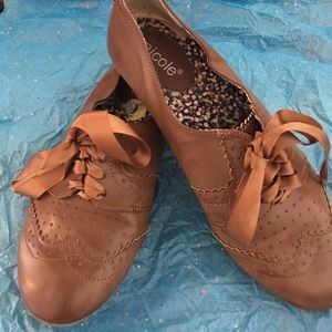 Brown flat shoe.  Cognac