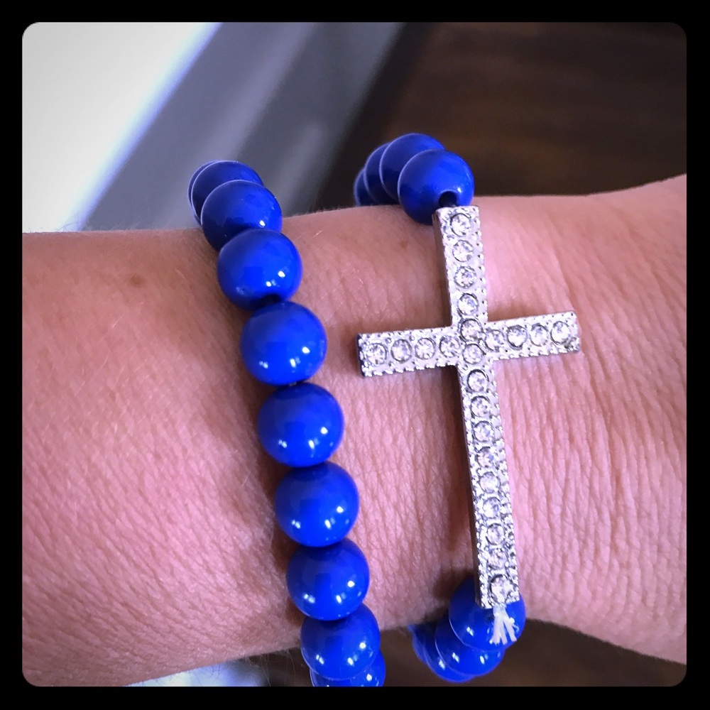 Beaded bracelet set with rhinestone cross detail
