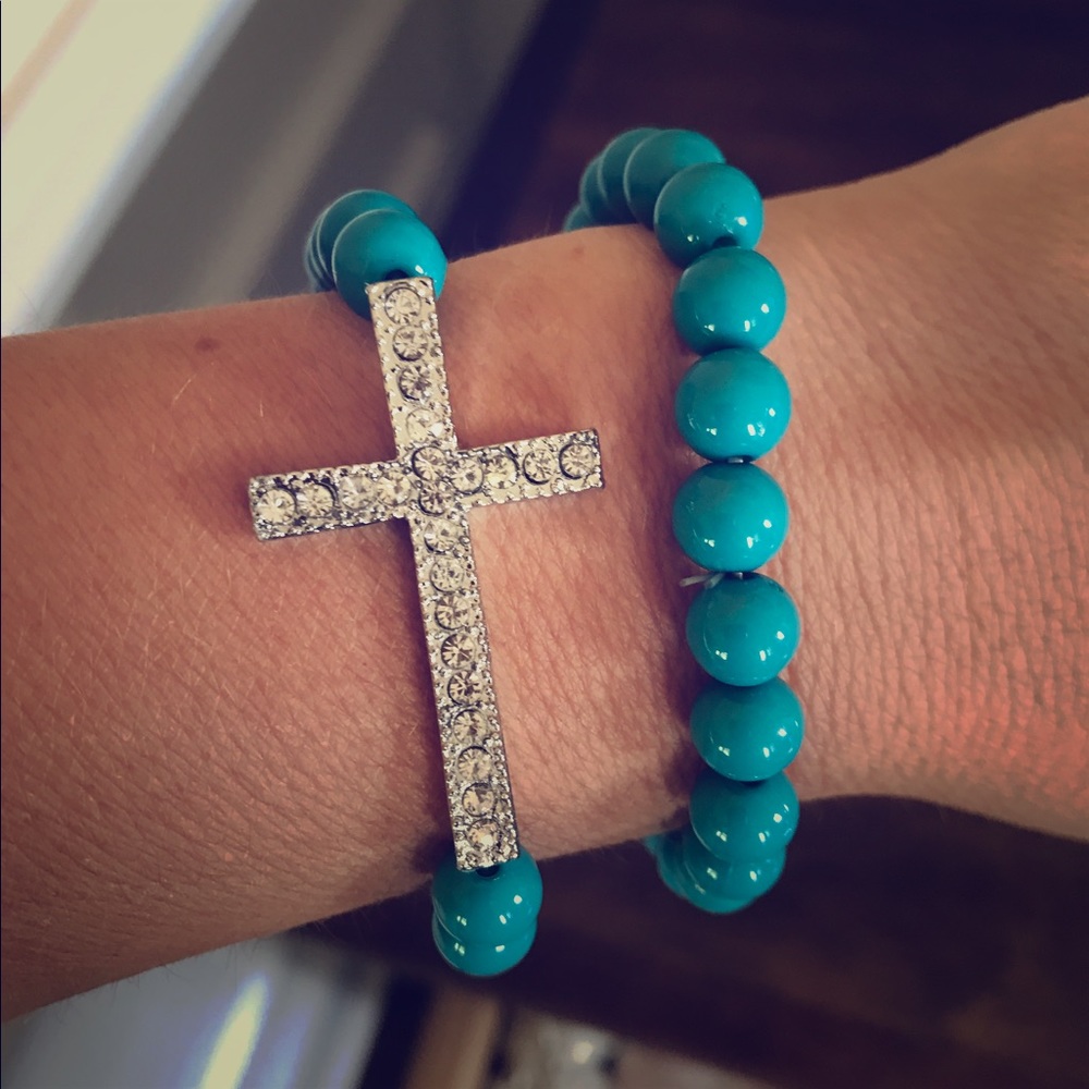 Beaded bracelet set with rhinestone cross detail