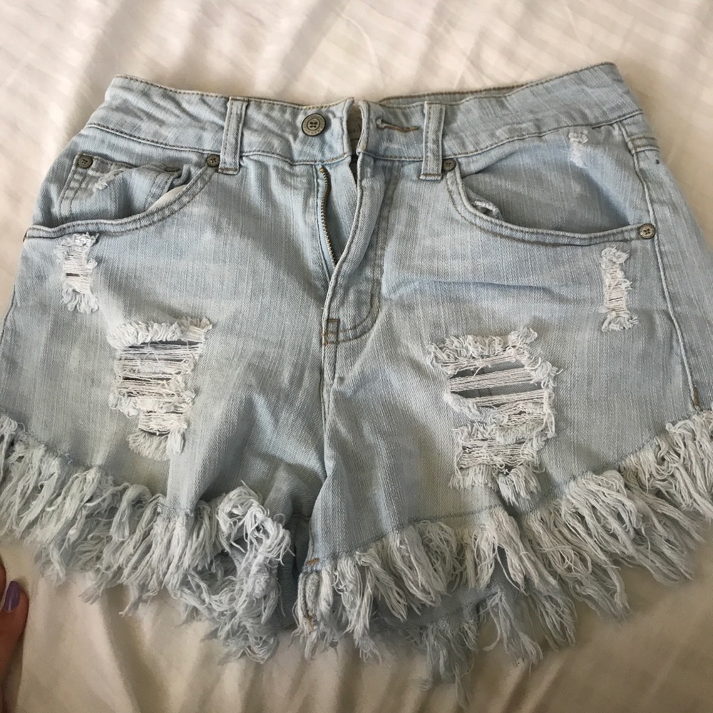 light blue ripped denim short