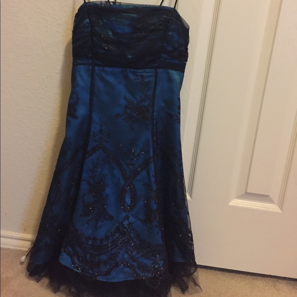 Sparkly blue and black dress be Morgan and Co.