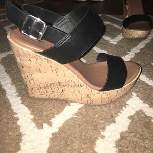 Wedge heels. Size 7.5. Black with cork heel.