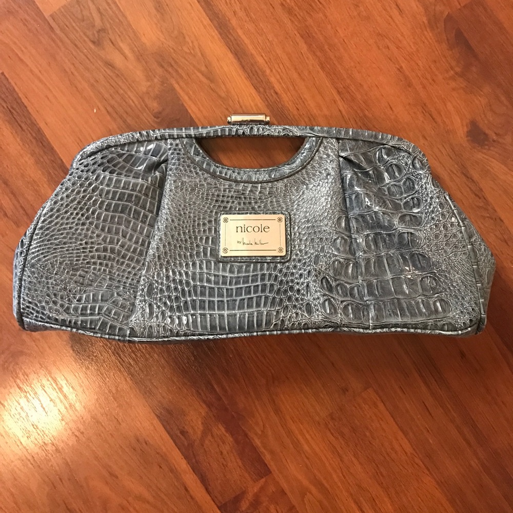 Gorgeous blue Nicole Miller clutch.