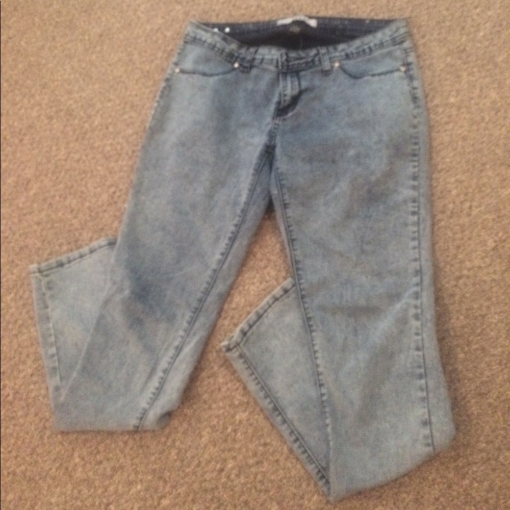 a pair of o.s.c. jeans . never worn .