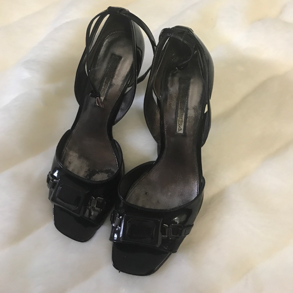 Black via sprigs heels