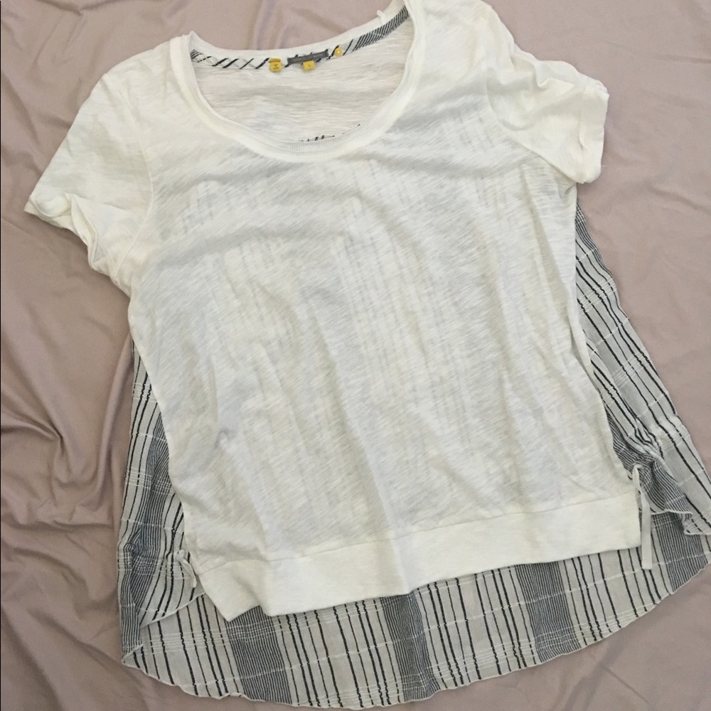 White front and striped back tshirt.
