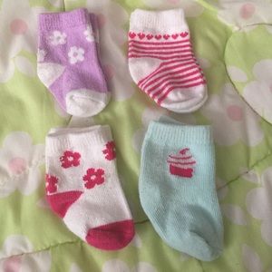 4 pairs of newborn socks