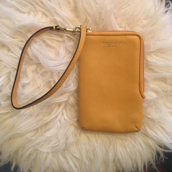 Coach Handbags - Coach fall yellow wristlet clutch