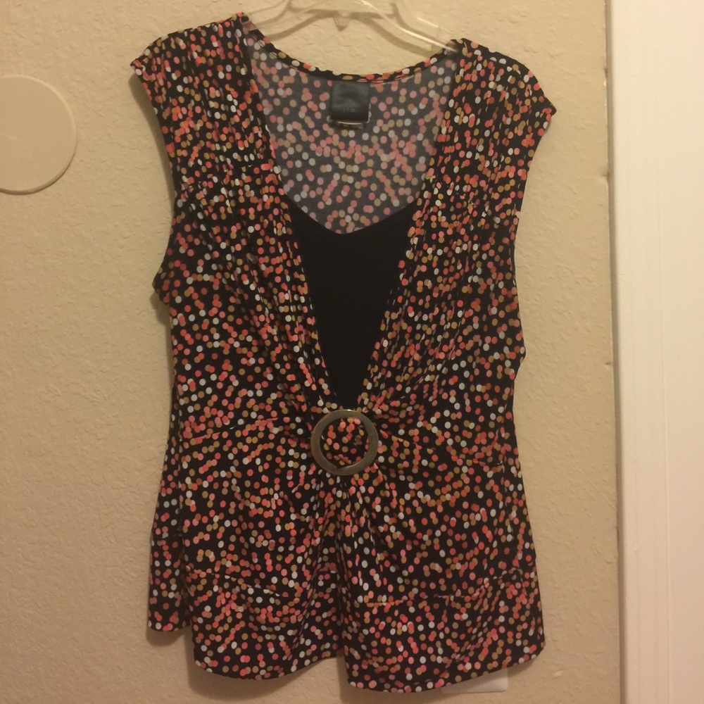 Sleeveless blouse, appropriate for work.