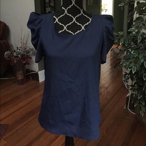 Silky, ruched sleeved blouse.