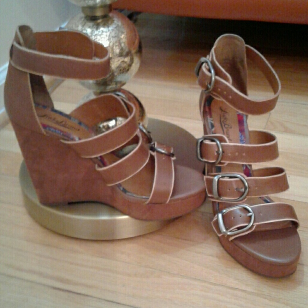 Brown strapped platforms