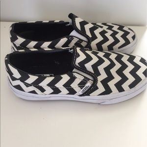 Vans signature black and white Slip ons