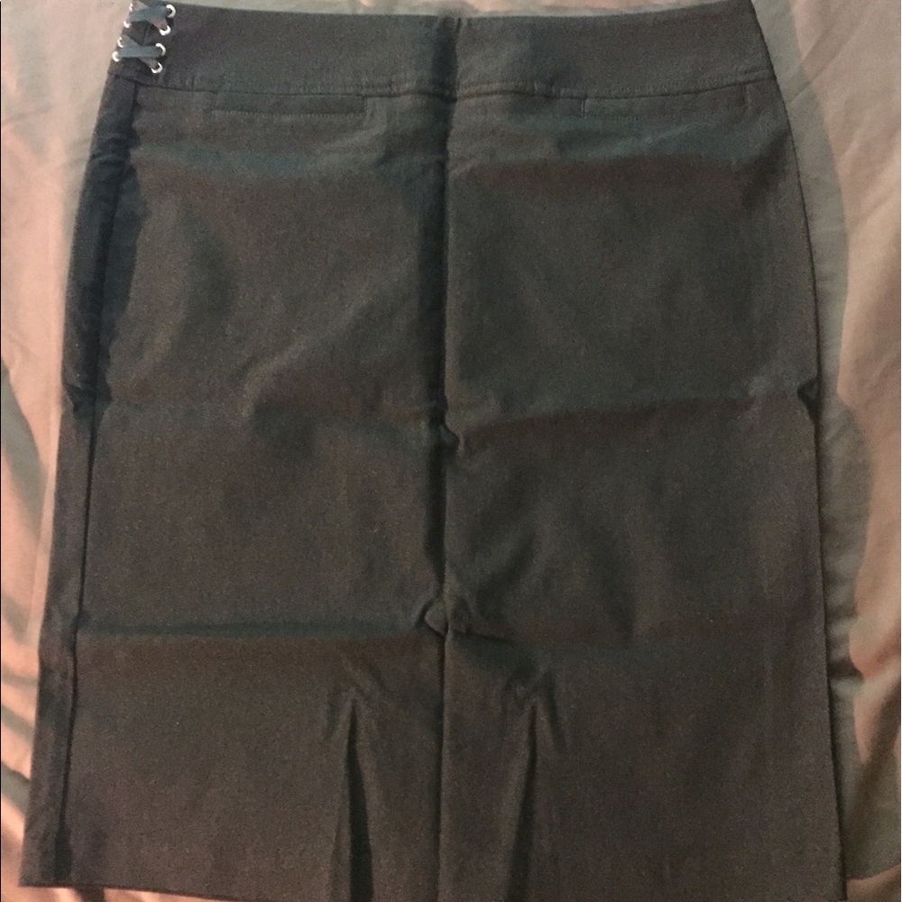Long pencil skirt with lace up detail on sides