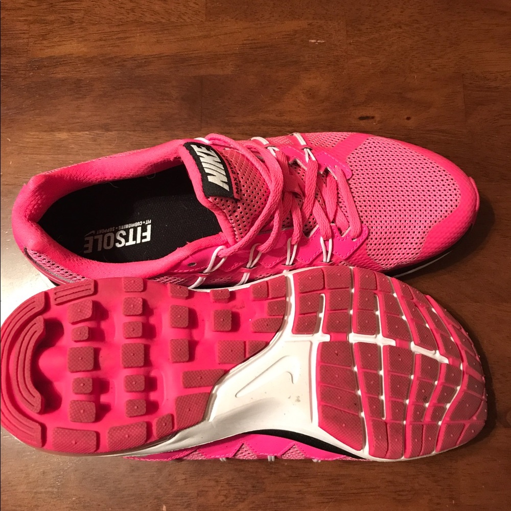 Pink Nike running shoes. Only worn 3x!! Clean