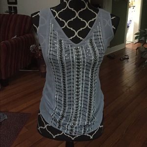 Beautifully sheer and beaded tank