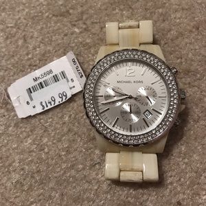 Michael Kors "horn" watch with pave stoned face
