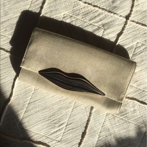 DVF lip clutch