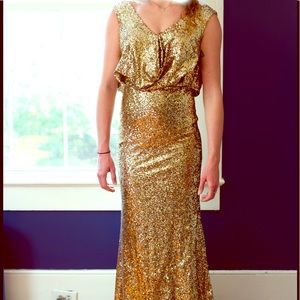 Floor length gold sequined gown by Tony Bowls.