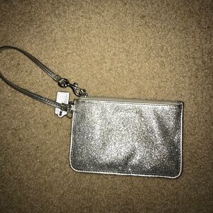 Silver coach wristlet